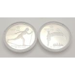 Two Commemorative 1988 Calgary Winter Olympic Games Silver Coins. Both weigh a troy ounce and are