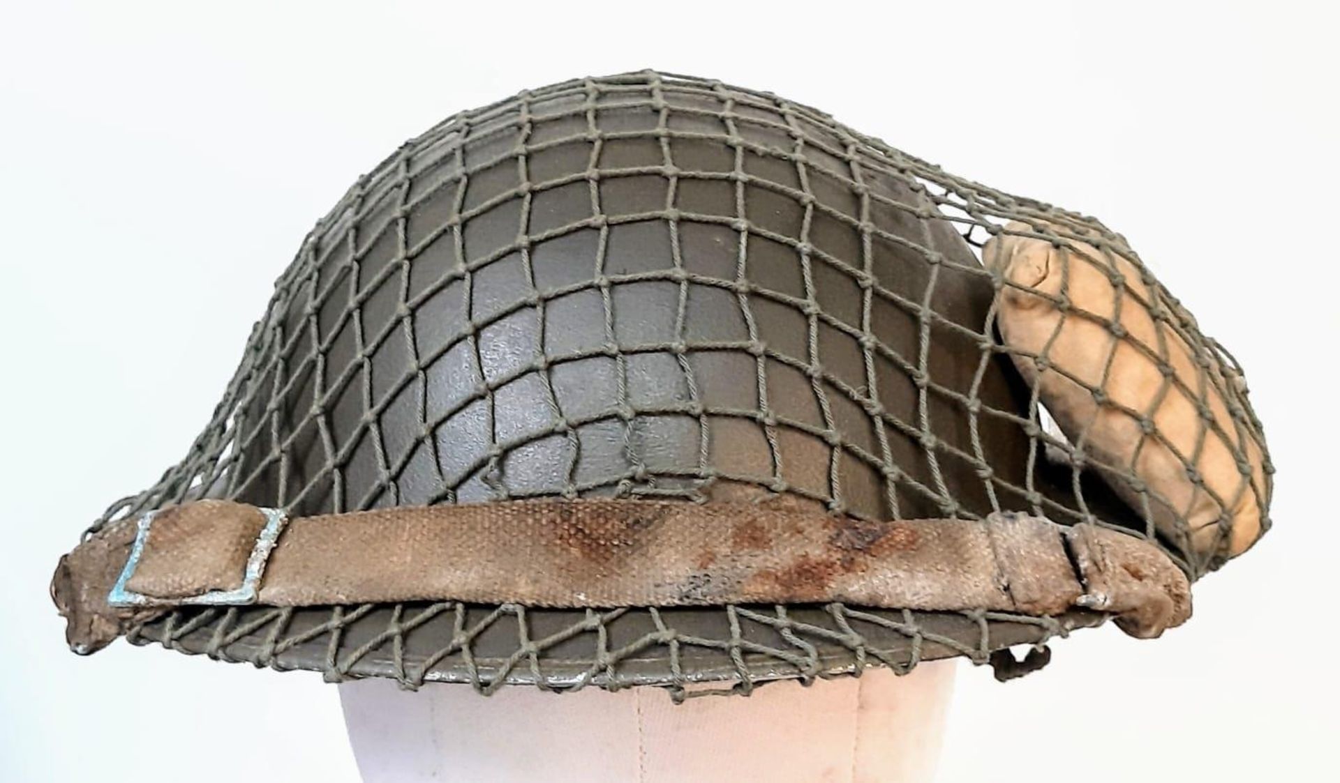 WW2 British MK II Helmet with Cam Net and 1944 Dated (D-Day) Field Dressing. - Image 2 of 5