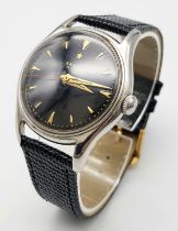 A Vintage Zenith 18 Jewels Mechanical Pilot Watch. 120 calibre. Automatic movement. Black leather