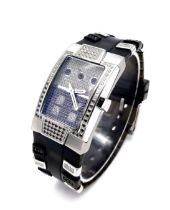 A TechnoMarine 1.25ctw White and Black Diamond Ladies Quartz Watch. Resin and diamond strap.