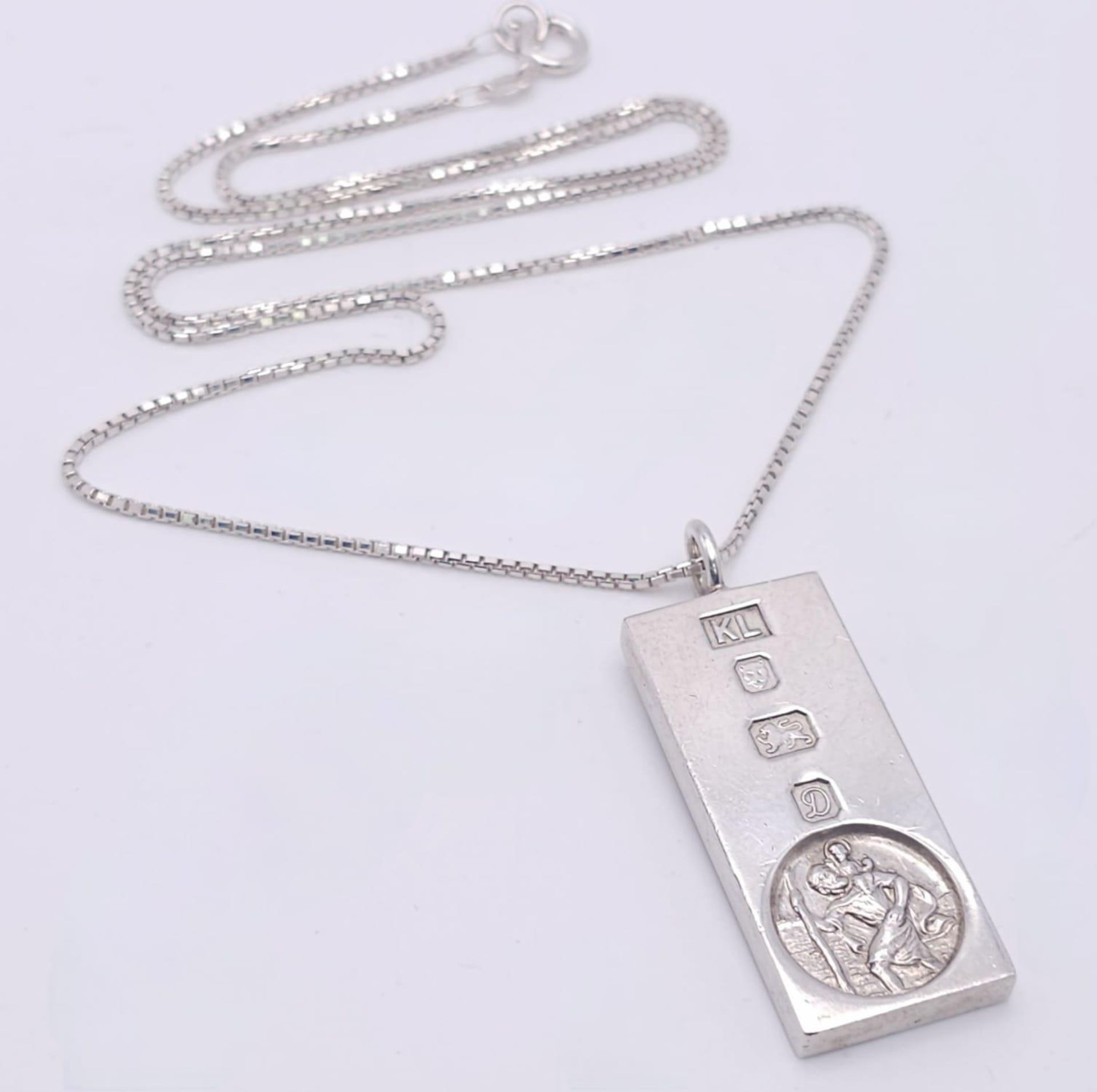 A Sterling Silver St. Christopher Ingot Pendant on a Silver Necklace. 5cm - pendant. 58cm necklace