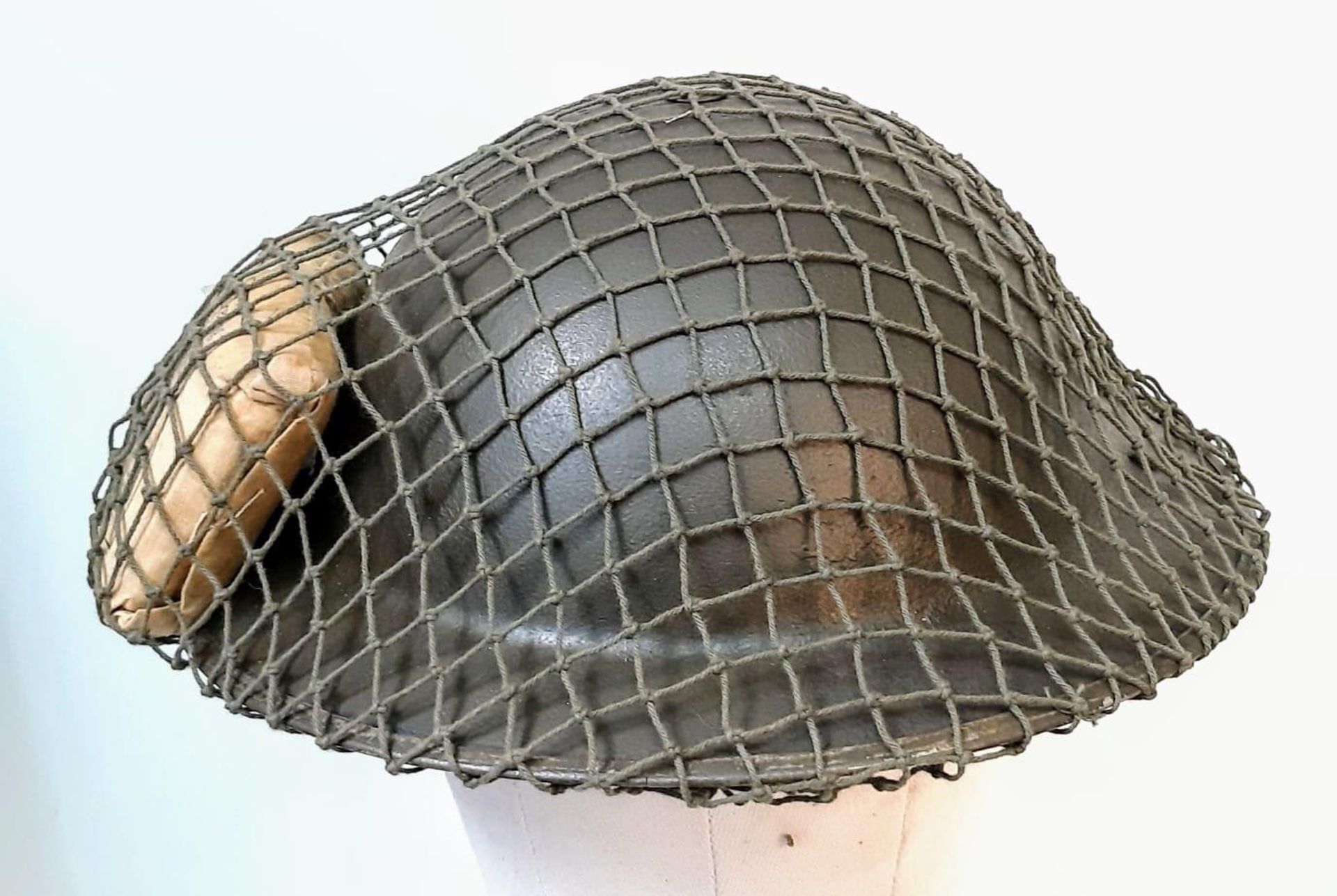 WW2 British MK II Helmet with Cam Net and 1944 Dated (D-Day) Field Dressing. - Image 4 of 5