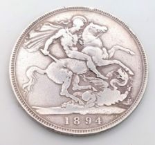 An 1894 Queen Victoria Silver Crown. VF grade but please see photos.