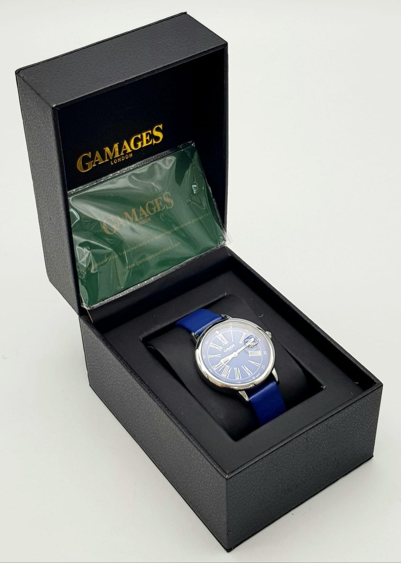 A Gamages of London Quartz Ladies Watch. Blue leather strap. Stainless steel case - 37mm. Ice blue - Image 6 of 6