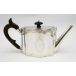 A 1785 Hester Bateman George III Silver Teapot. Oval form with empty cartouche to side. Minimalist