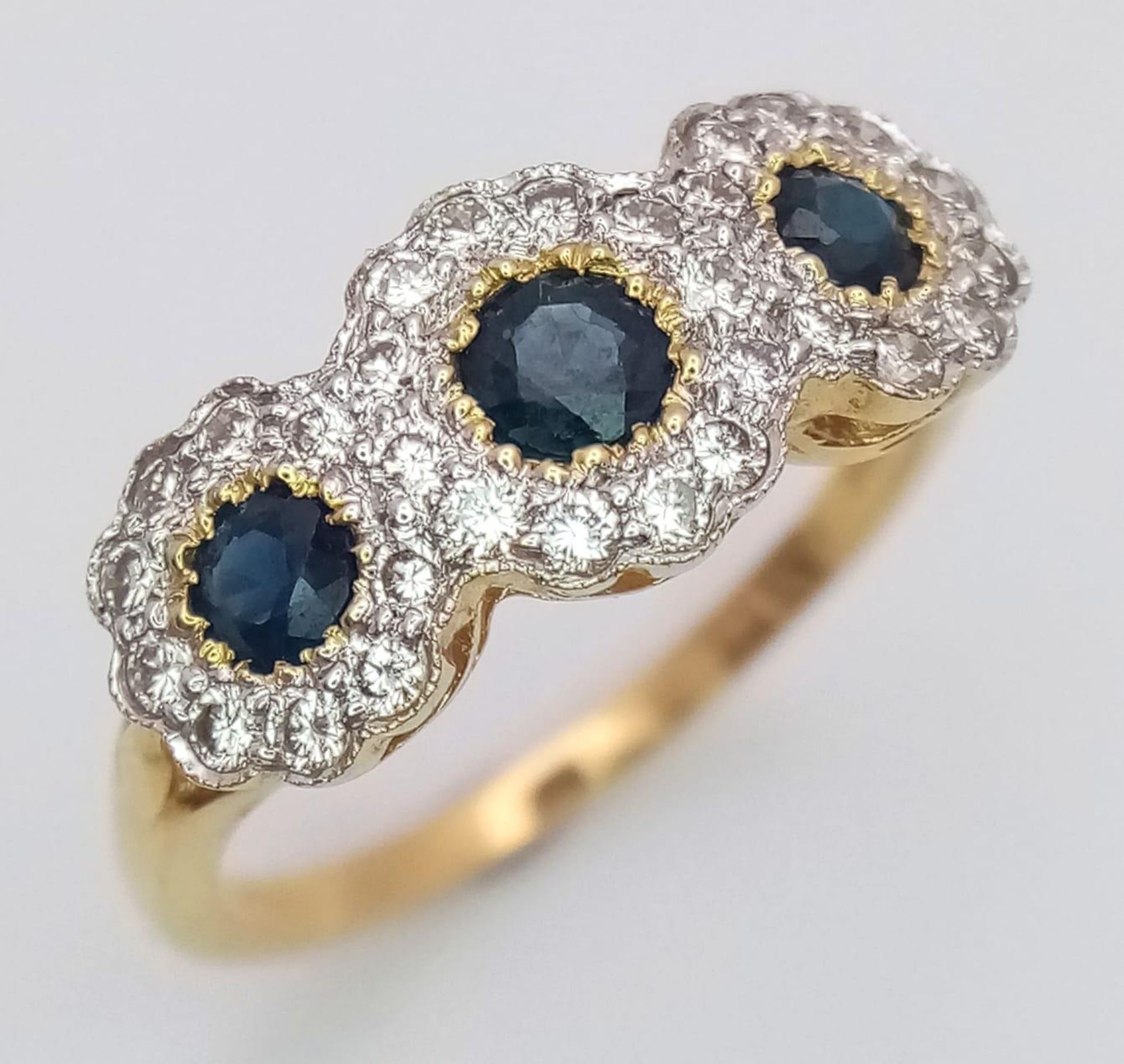 A 18K YELLOW GOLD DIAMOND & SAPPHIRE TRIPLE CLUSTER RING, APPROX 0.35CT DIAMONDS, WEIGHT 3.2G SIZE O - Image 2 of 4
