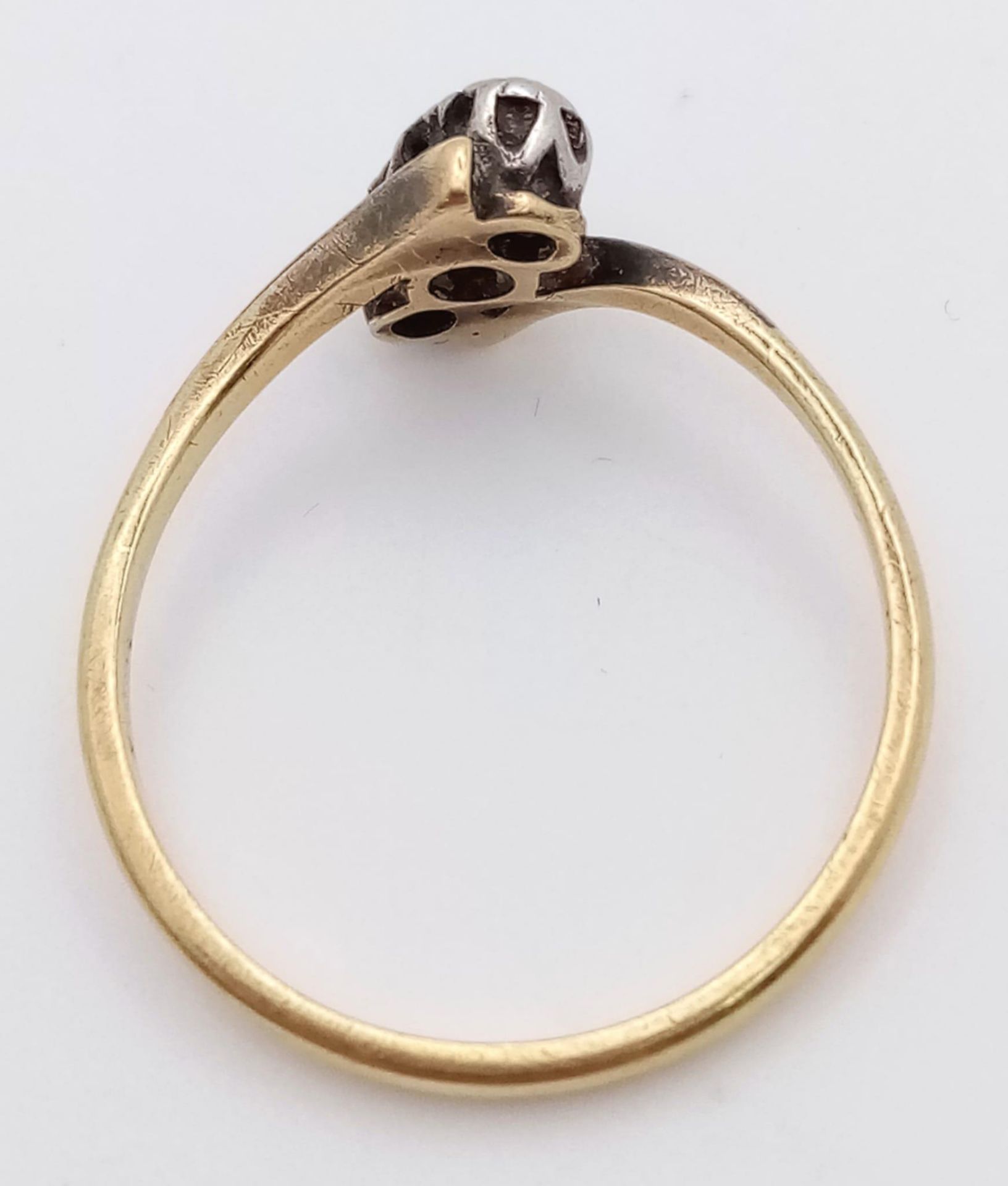 A Vintage 18K Yellow Gold (tested) Old-Cut Diamond Crossover Ring. Size O. 2.25g total weight. - Image 4 of 4