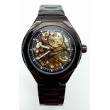 An Anthony James of London Automatic Skeleton Gents Watch. Black ceramic bracelet and case - 42mm.