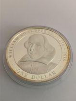 SILVER DOLLAR COIN Commemorating the life of William Shakespeare. Minted by the Cook Islands in
