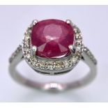 A Delicate 4ct Ruby Ring with 0.45ctw of Diamond Accents. Set in 925 Silver. Size M. 3.66g total