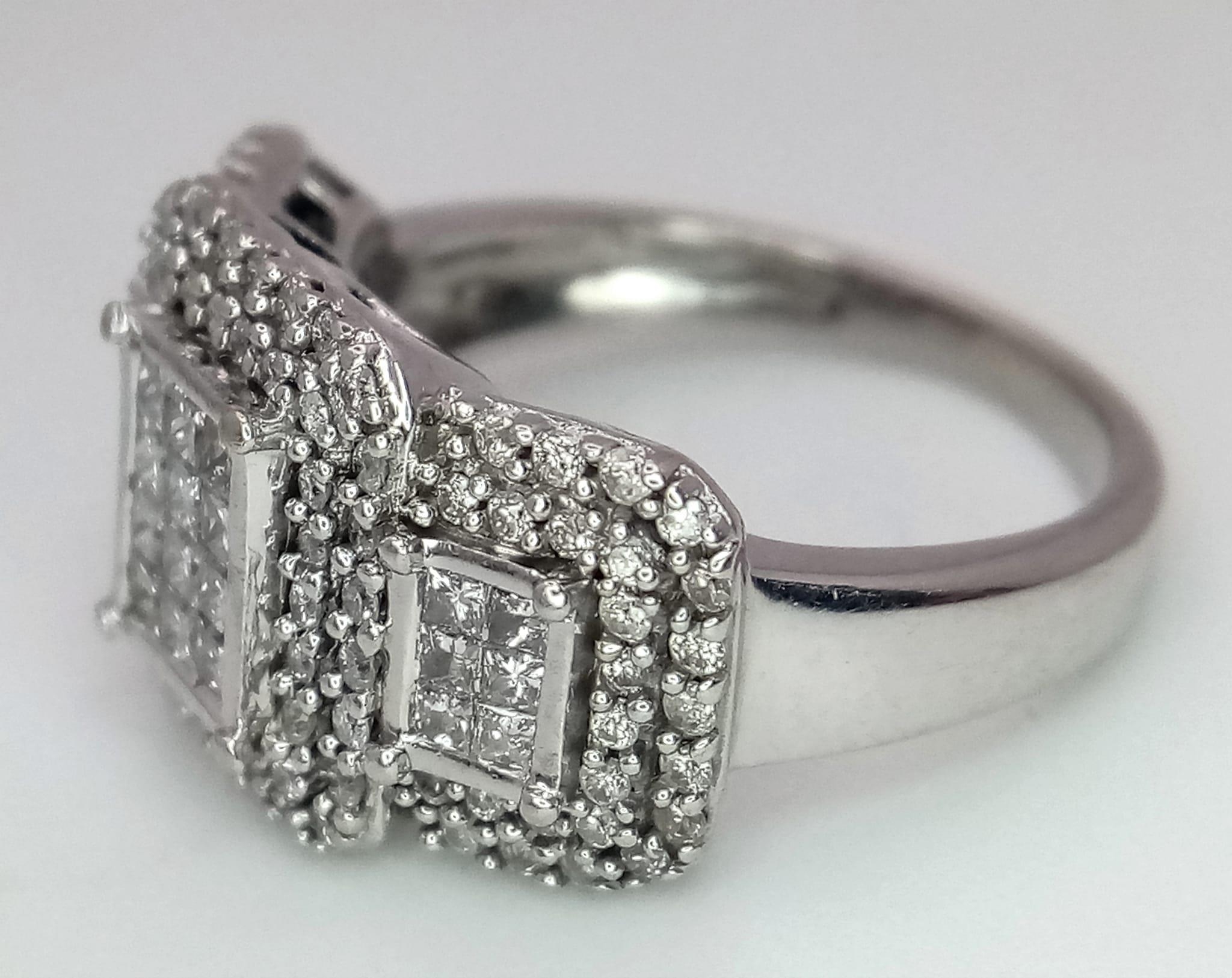 An Art Deco Style 18K White Gold and Diamond Ring. A belt-buckle design of round and princess cut - Image 4 of 7