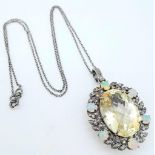 A Citrine Pendant with Opal and Diamond Surround on 925 Silver Chain.22ct citrine, 1.30ctw opals,