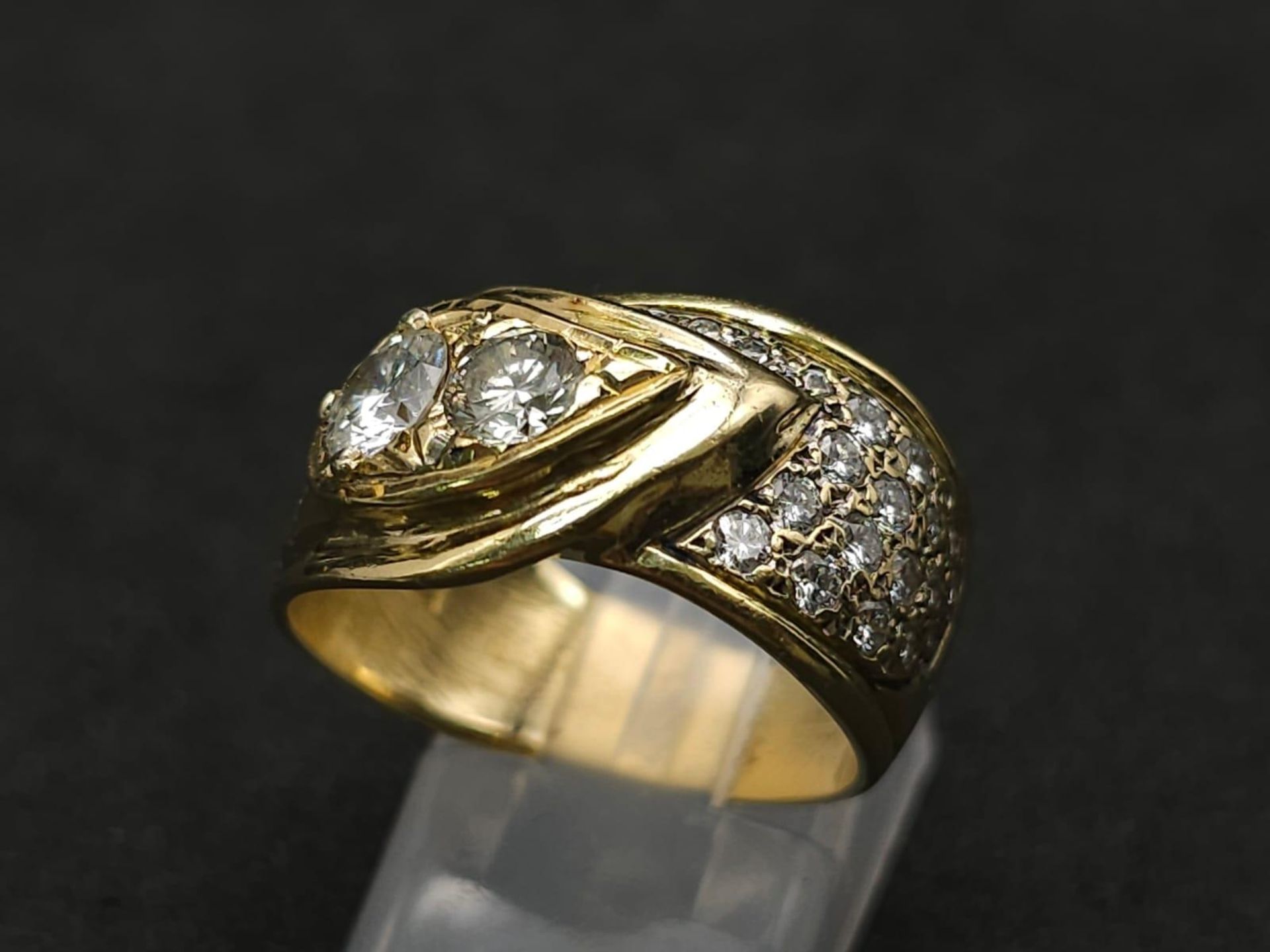 An 18kt Yellow Gold Ring with a duo of Round Cut Diamonds on one side, offset by a pavement of - Image 2 of 8