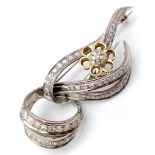 Diamond encrusted 18kt White & Yellow Gold Brooch. Beautifully woven White Gold design, adorned with