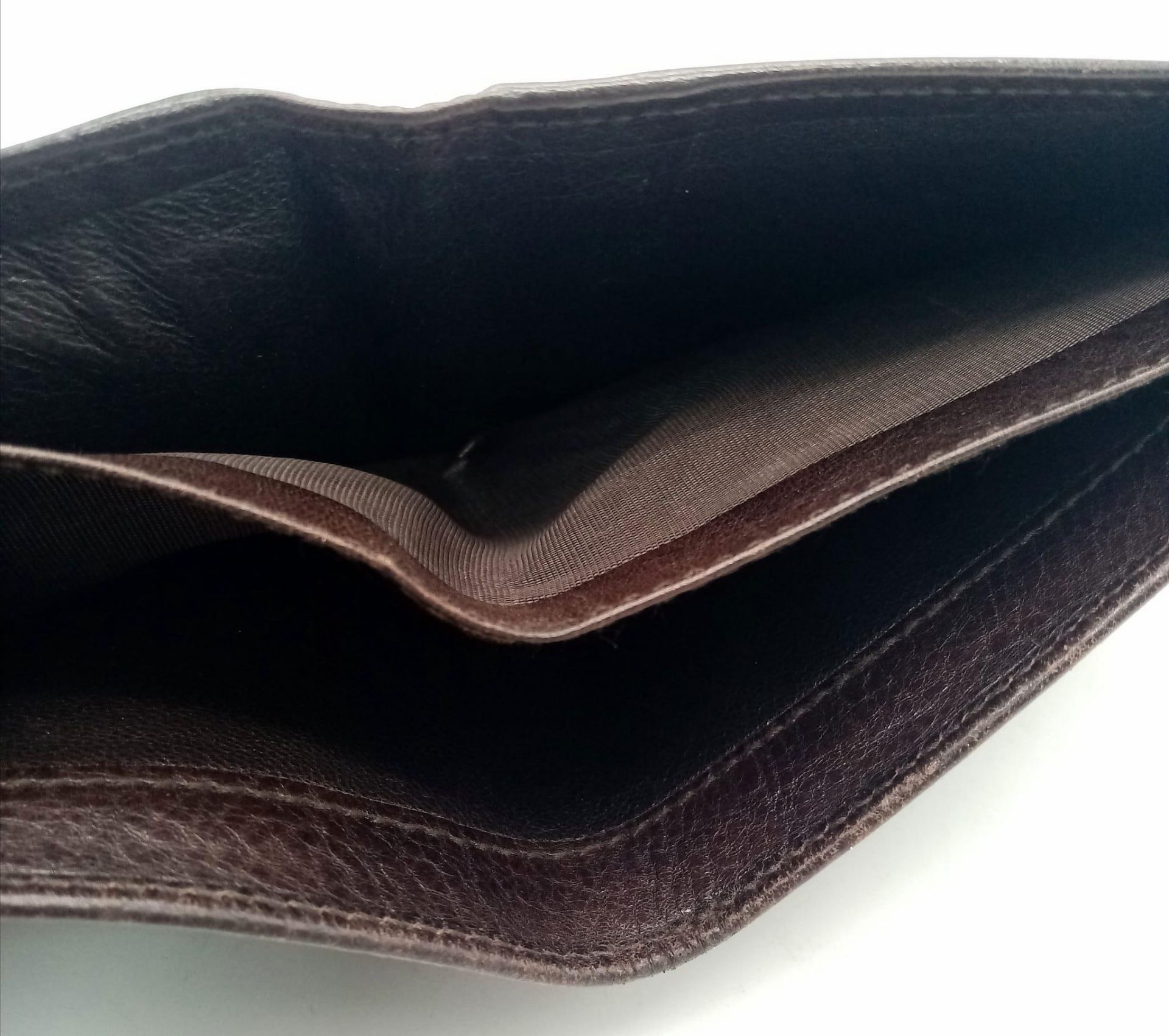 A dark brown leather Gucci card wallet, 3 card holders with a popper pocket. Size approx. - Image 4 of 6