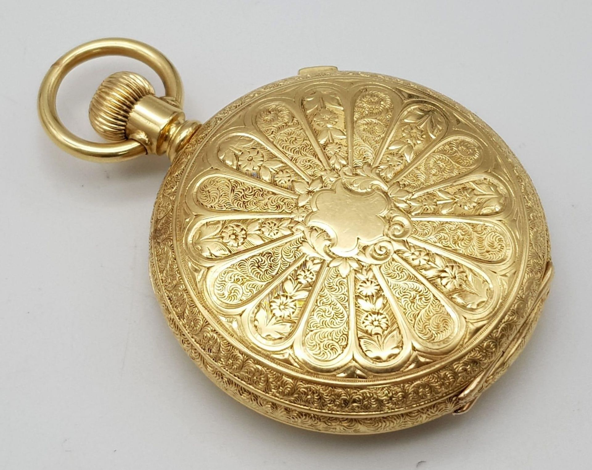 An Antique Waltham 18K Gold Full Hunter Pocket Watch. The case is ornately decorated in a floral - Image 4 of 13