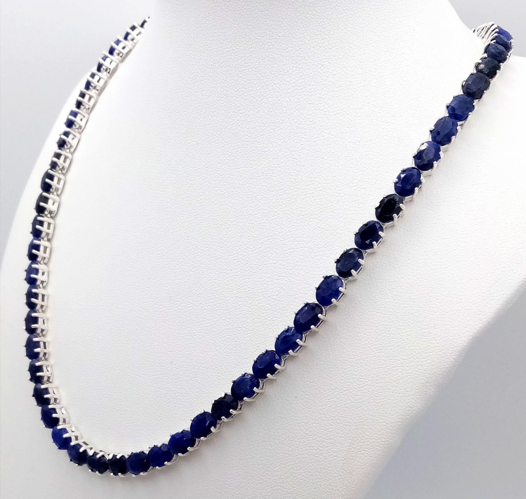 A Blue Sapphire Gemstone Tennis Necklace set in 925 Silver. 45cm length. 39.7g total weight. CD-1229 - Image 2 of 4