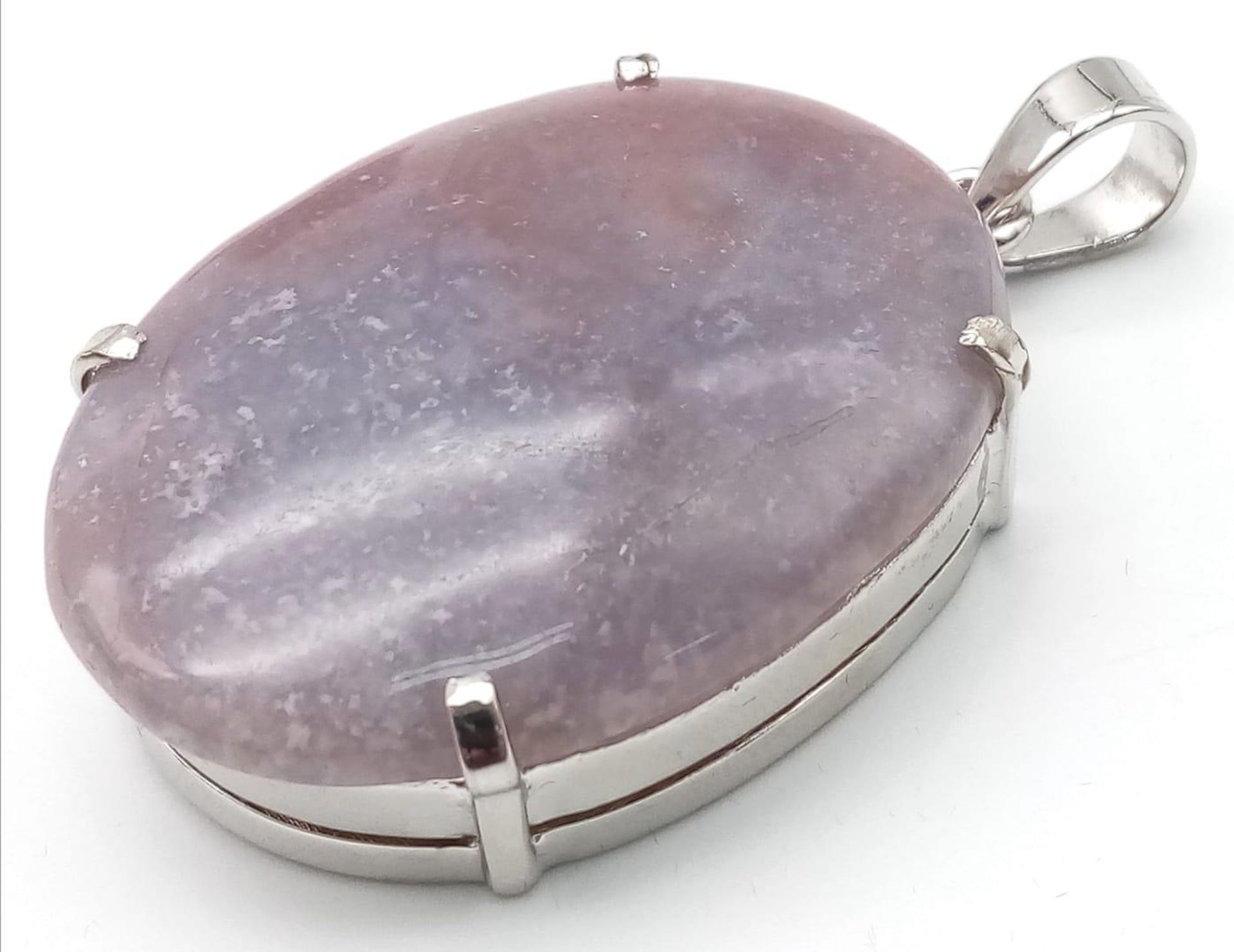 An Oval Cut Corundum Agate set in 925 Silver Pendant. 70ct. W-26.80g. 6cm. Comes with a presentation - Image 2 of 6