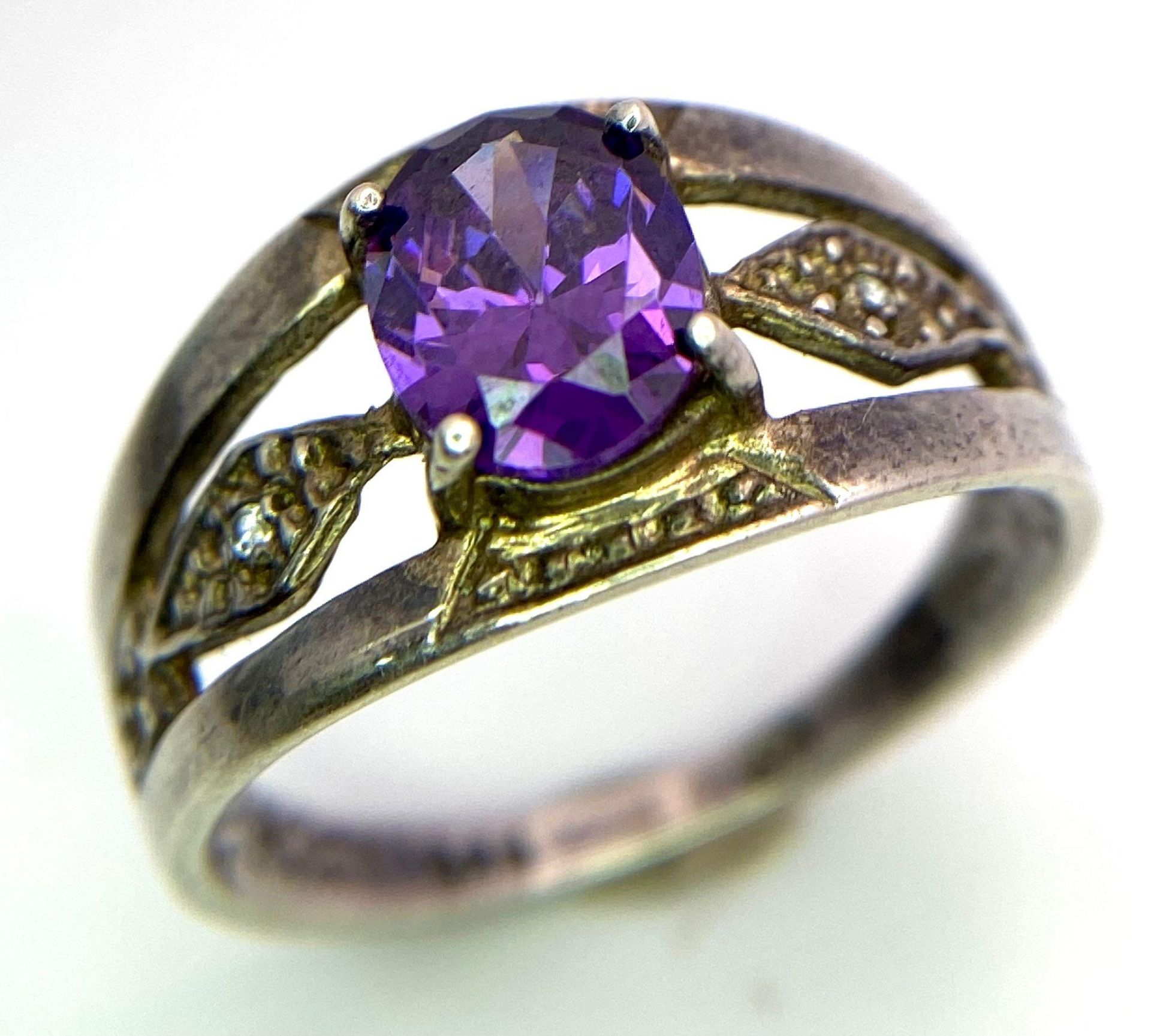 An Amethyst and 925 Silver Ring. Size P.