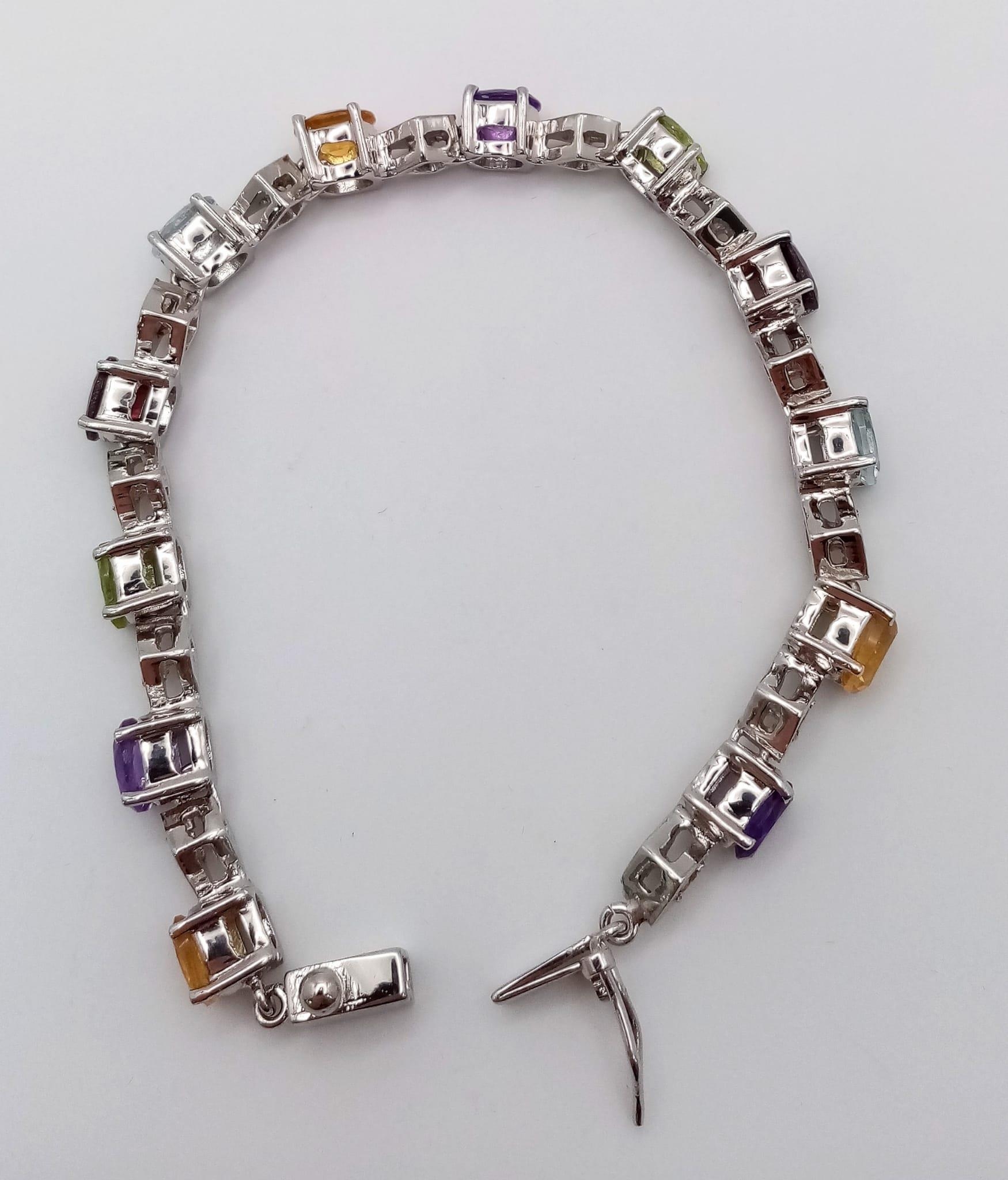 A Multi Gemstones 925 Silver Tennis Bracelet - Includes: Peridot, Citrine, Amethyst, Aquamarine - Image 3 of 4