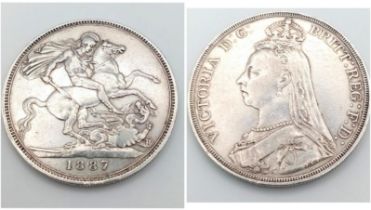 An 1887 Queen Victoria Silver Crown Coin. VF grade but please see photos.