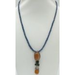 An Opal and Sapphire Bead Necklace with Diamonds. Two Opal Pendants with a halo of diamond accents