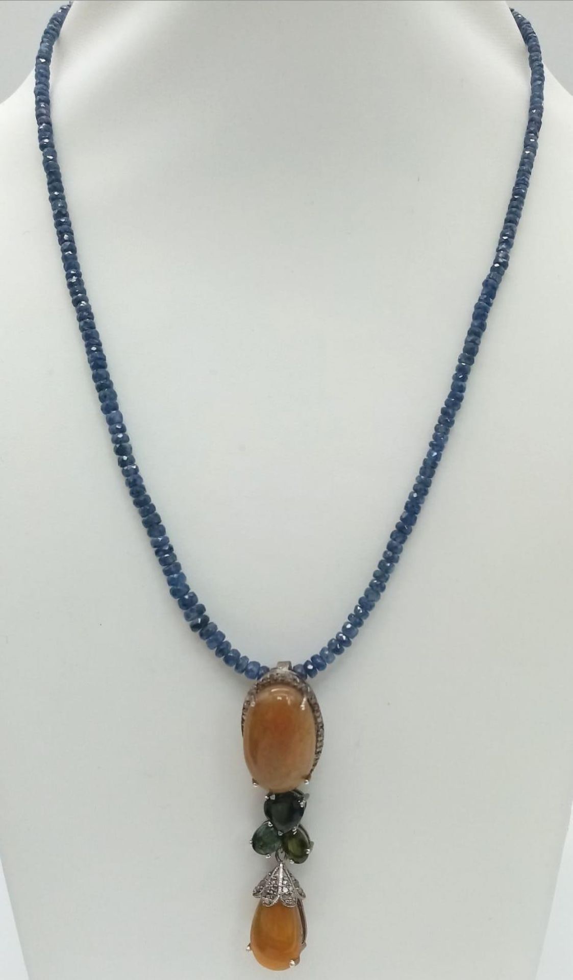 An Opal and Sapphire Bead Necklace with Diamonds. Two Opal Pendants with a halo of diamond accents