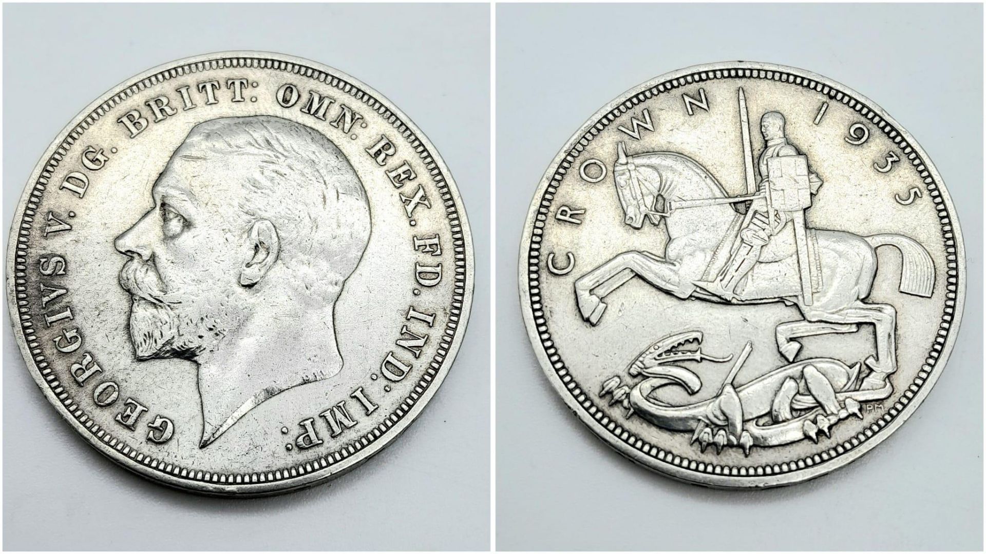 A 1935 George V Silver Rocking Horse Crown. EF grade but please see photos.