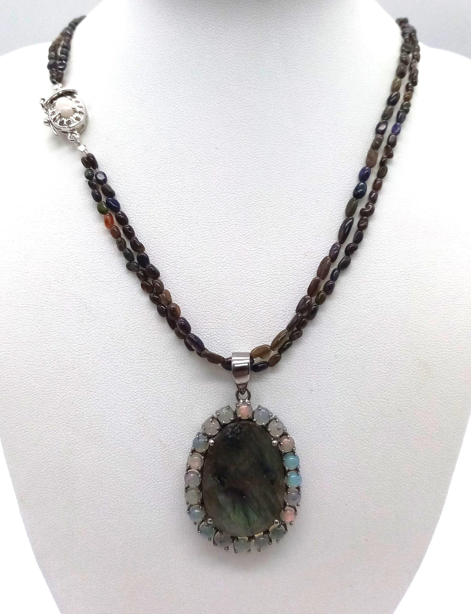 An Ethiopian Black Opal Bead Necklace with a Labradorite 925 Silver Pendant with White Fire Opal