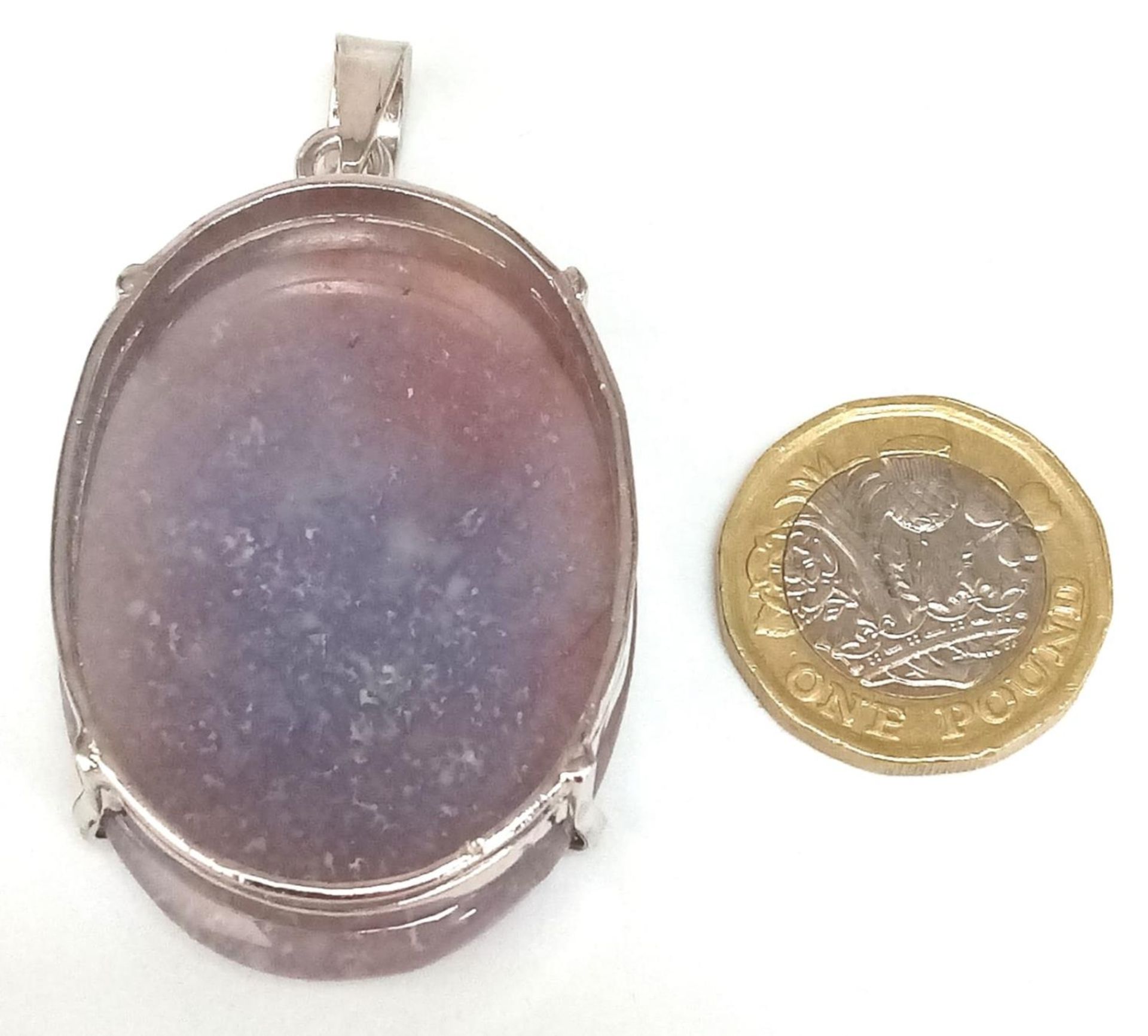 An Oval Cut Corundum Agate set in 925 Silver Pendant. 70ct. W-26.80g. 6cm. Comes with a presentation - Image 4 of 6