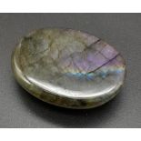 A 49.95Ct Cabochon Labradorite in Oval Shape. GLI Certified.