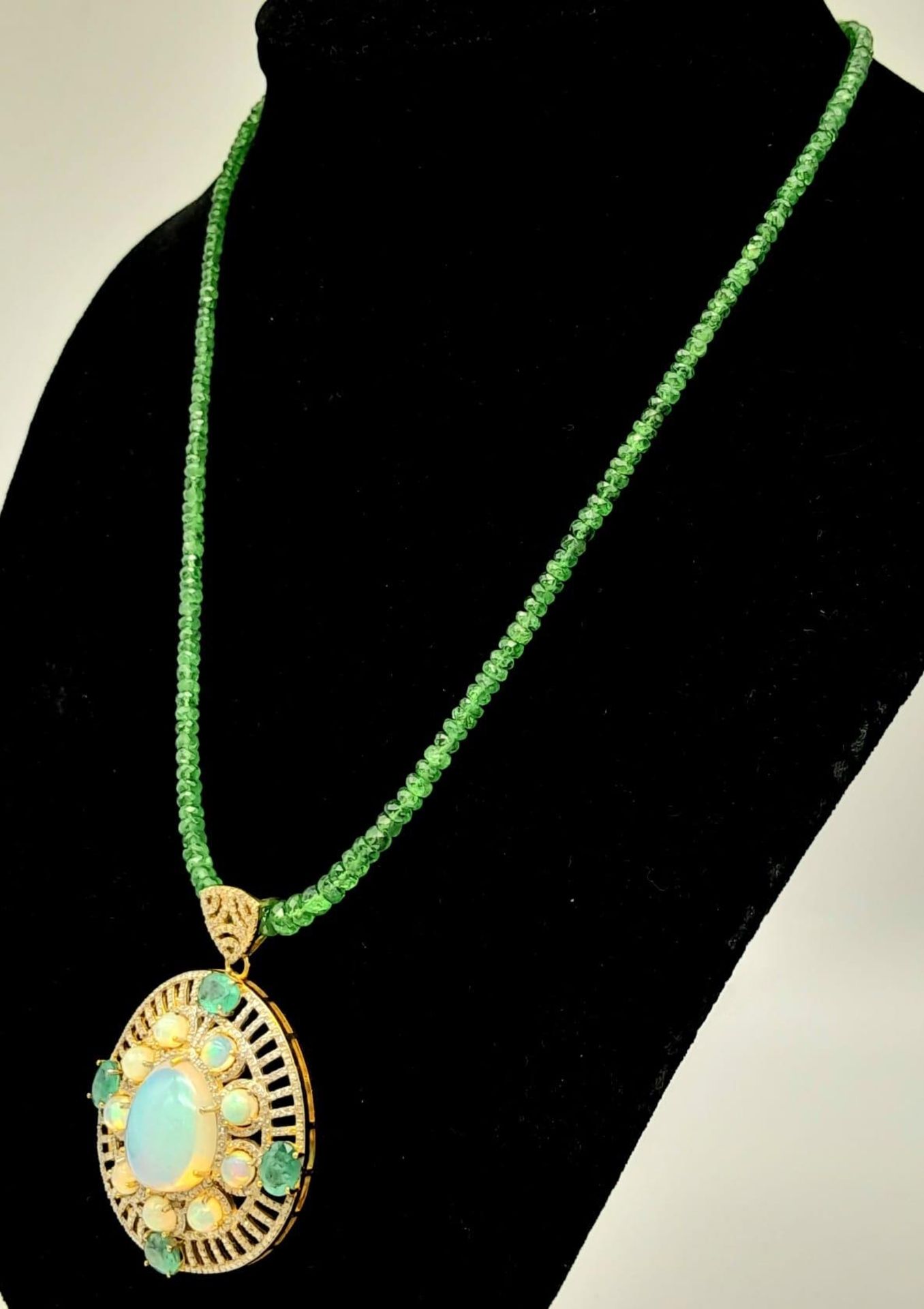 A Fancy Opal, Diamond and Emerald Pendant with a Detachable Green Garnet Necklace. Centre opal - Image 3 of 9