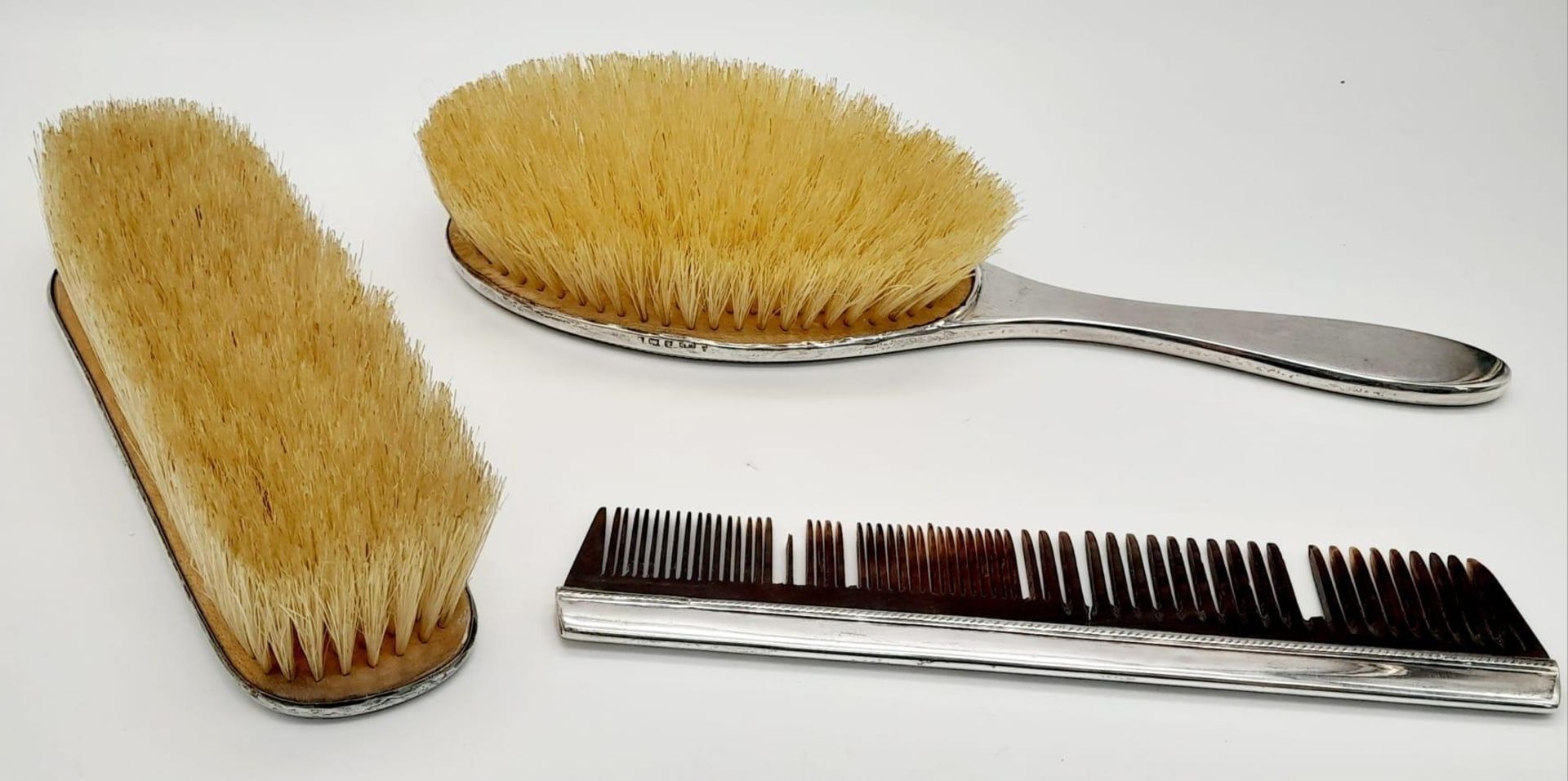 An Antique Sterling Silver Hair, Clothes Brush and Comb Set. Hallmarks for Birmingham 1919. Makers - Image 2 of 12