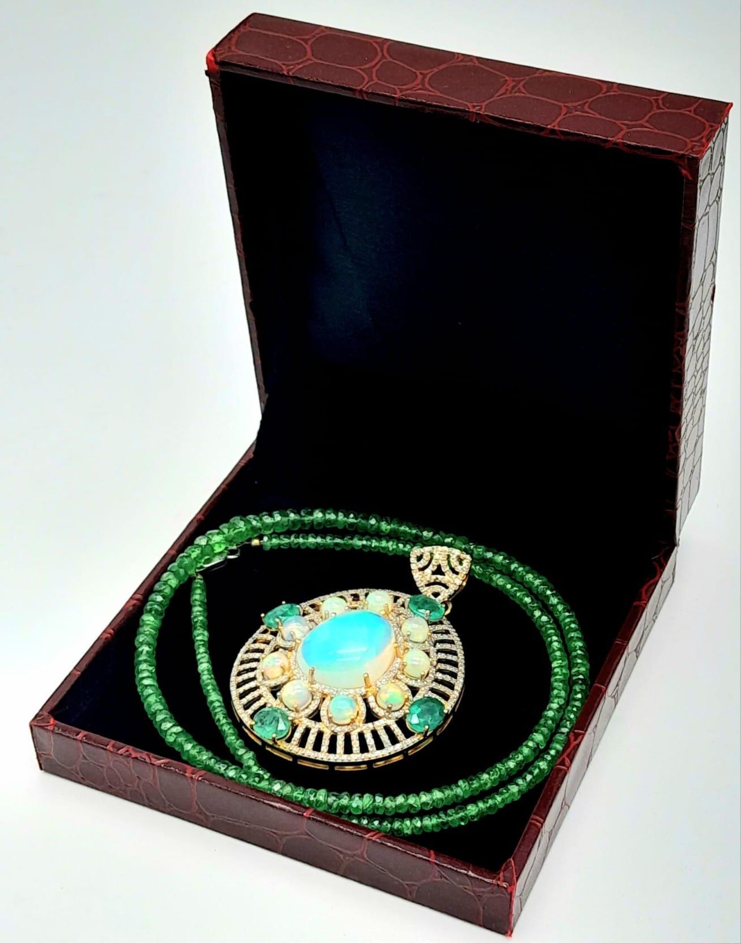 A Fancy Opal, Diamond and Emerald Pendant with a Detachable Green Garnet Necklace. Centre opal - Image 8 of 9