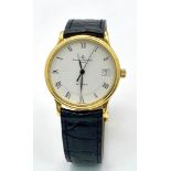 A Baume and Mercier 18K Gold Cased Automatic Gents Watch. Model - MV045075. Black leather strap. 18k