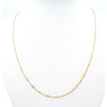 An Italian 9K Yellow Gold Twisted Flat Curb Necklace. 60cm length. 2.31g weight.