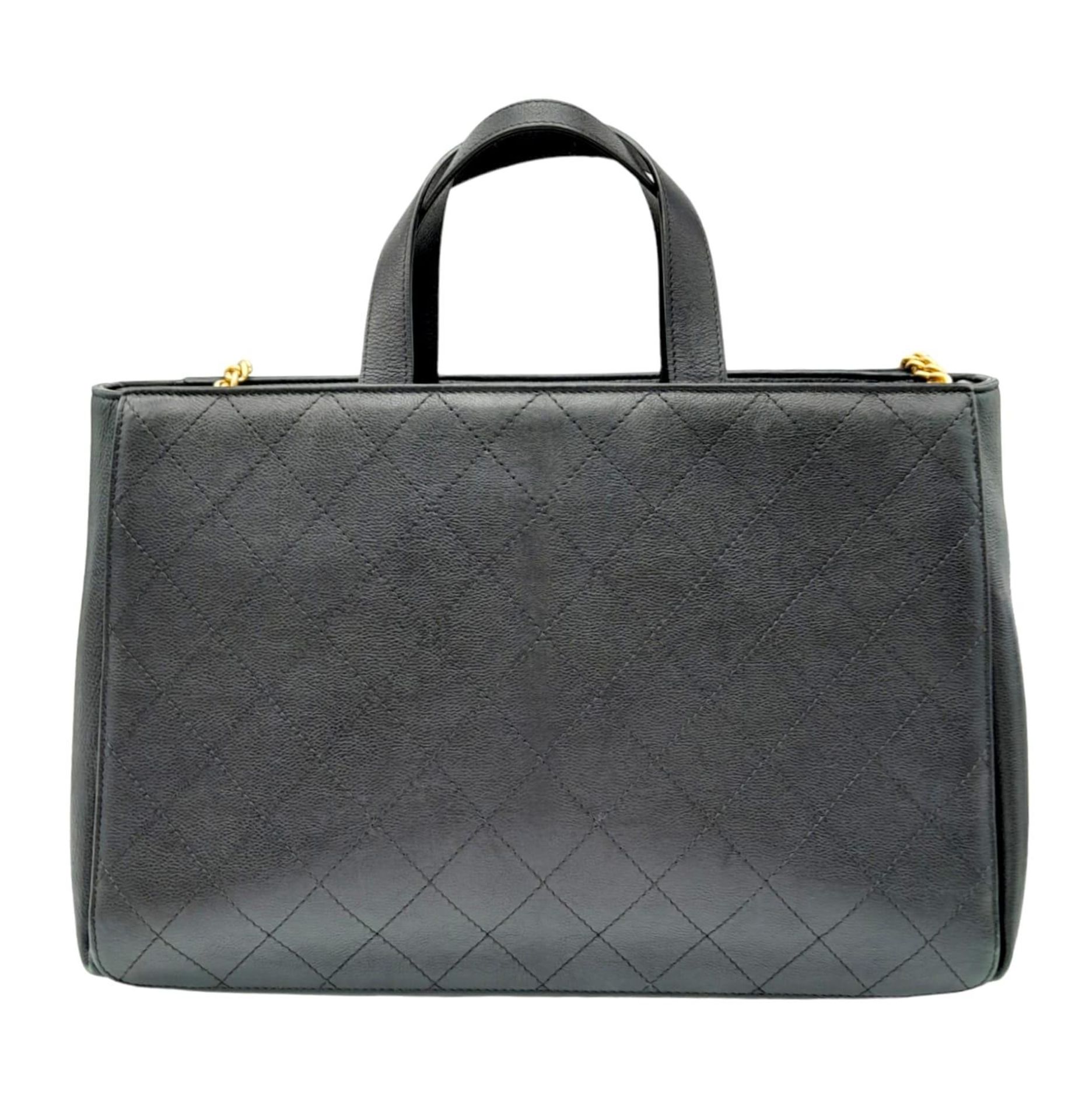 A Chanel black quilted caviar leather straight line tote bag. Silver and gold tone hardware, studded - Bild 3 aus 9