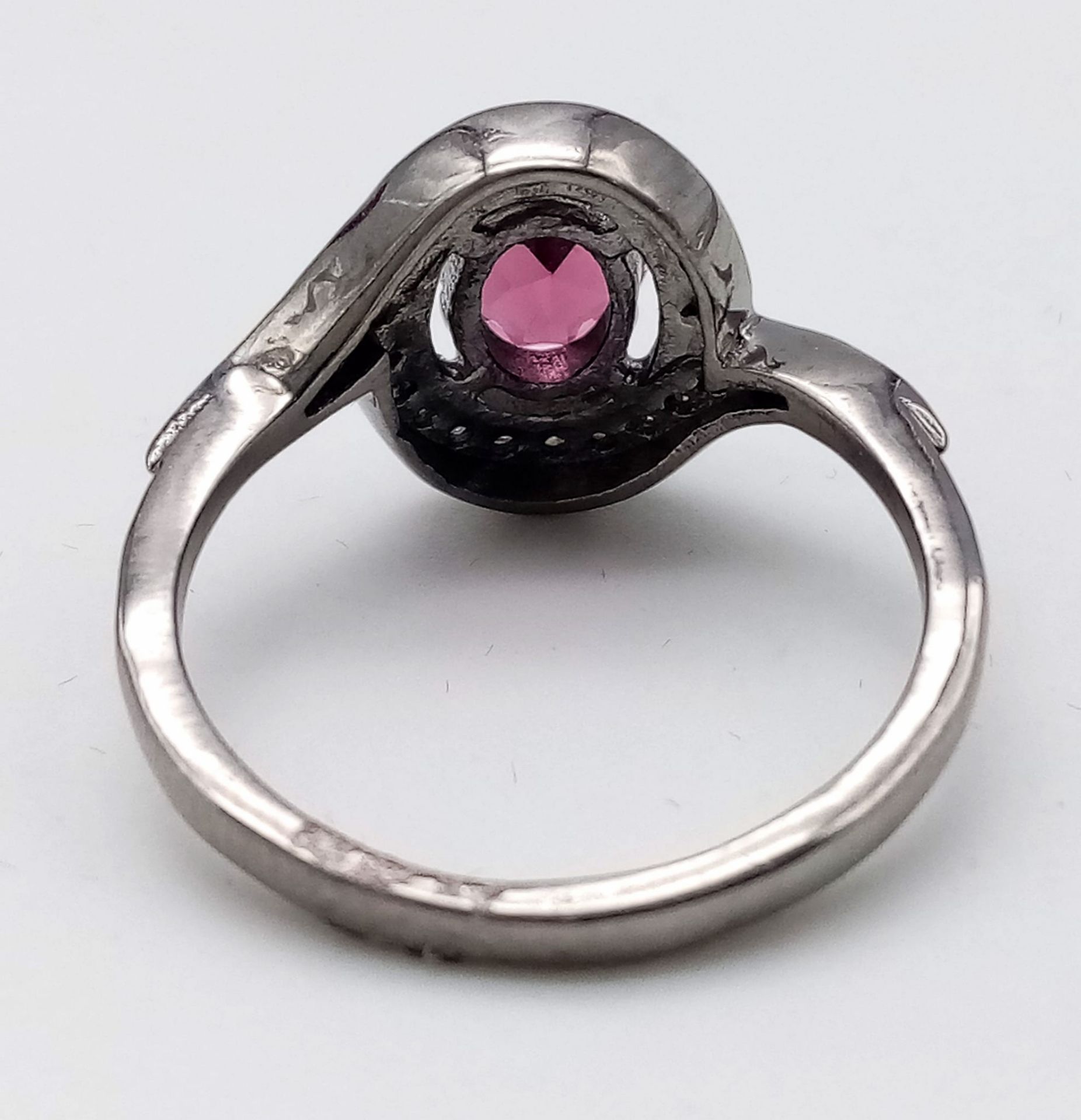 A Garnet and Diamond Ring set in 925 Silver with a Black Rhodium coating. Oval cut Garnet- 0.80ct. - Bild 2 aus 7