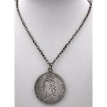 An 1891 Queen Victoria Silver Crown in a Pendant Setting on a Sterling Silver Chain. 41.21g total