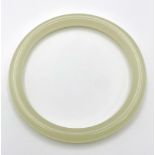 A Pale Green Thin Jade Bangle. 8mm width. 6cm inner diameter.