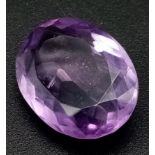 A 9.65ct, Oval Shape, Faceted Amethyst Gemstone. IGL&I Certified.