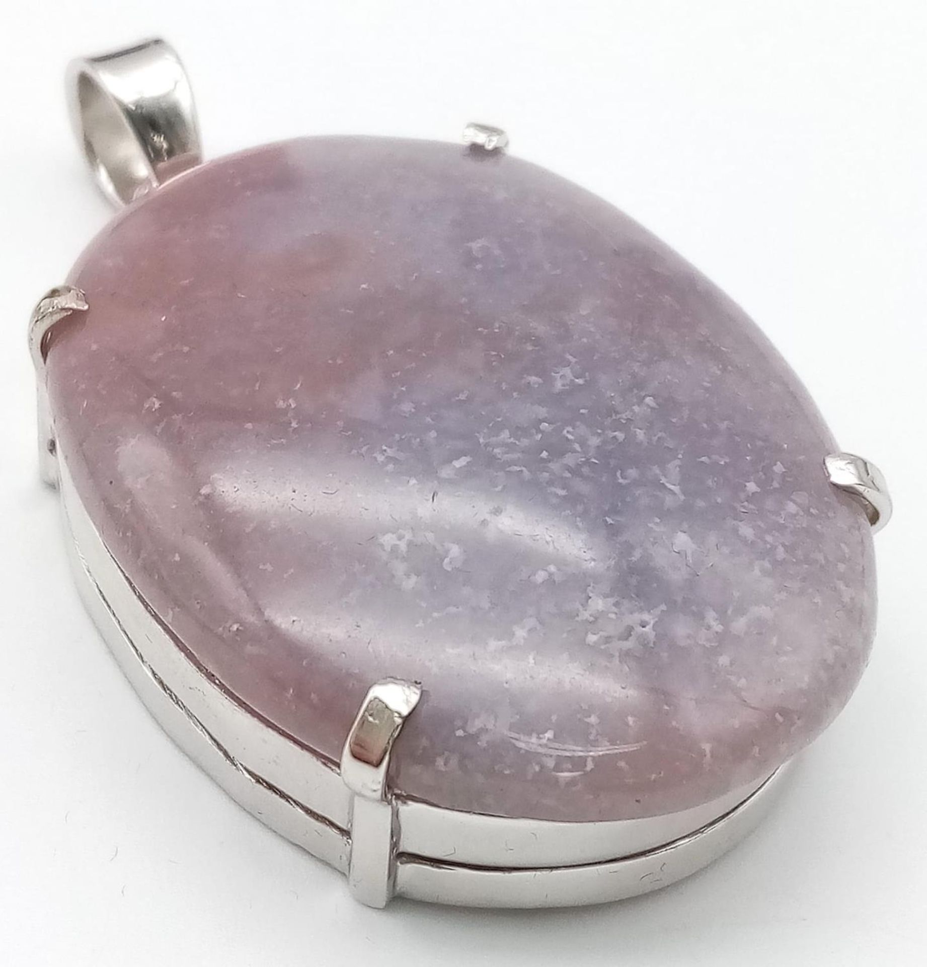 An Oval Cut Corundum Agate set in 925 Silver Pendant. 70ct. W-26.80g. 6cm. Comes with a presentation