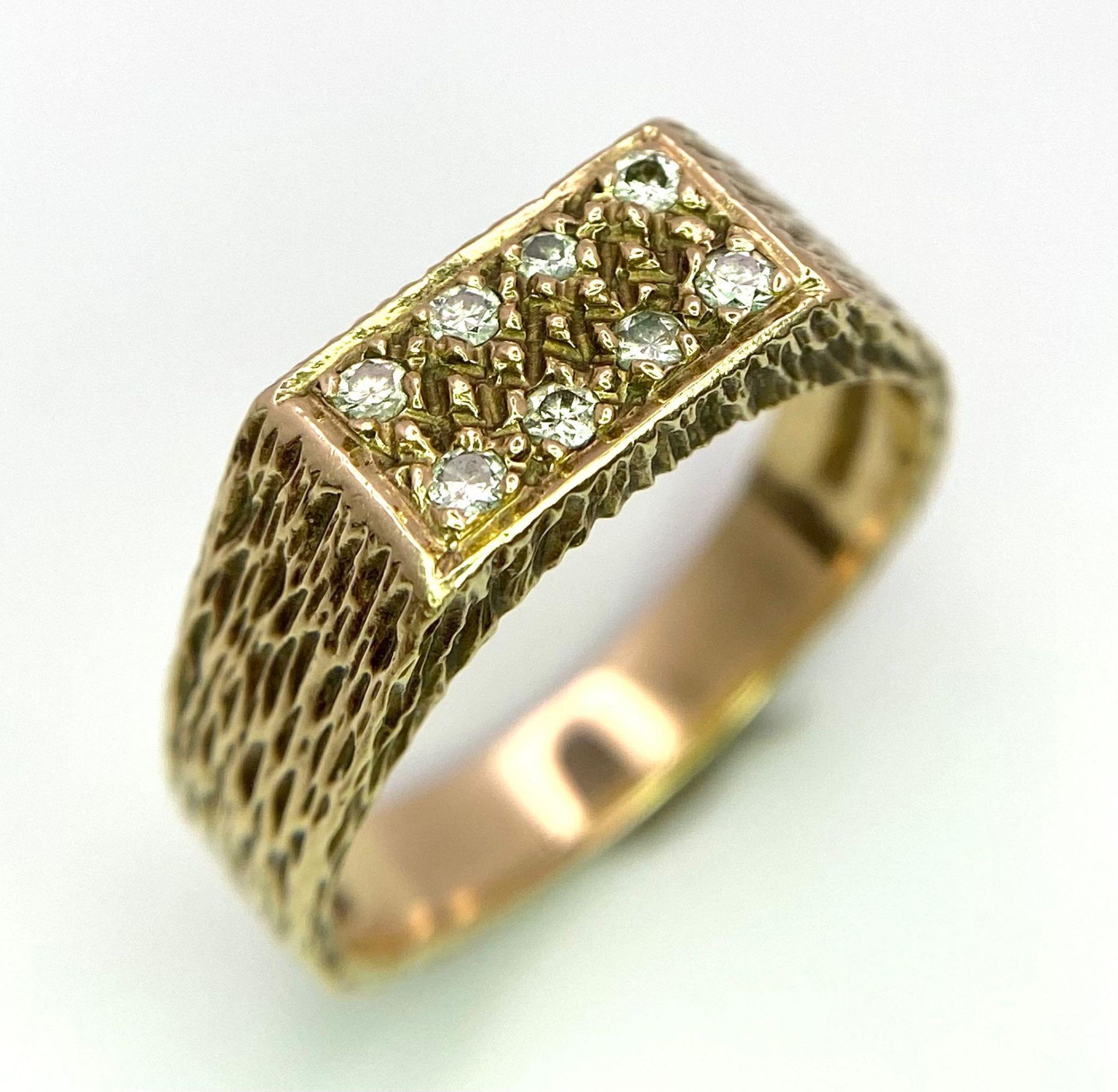 A Vintage 9K Yellow Gold and Diamond Signet Ring with Bark-Effect Decoration Throughout. Size Q/R.