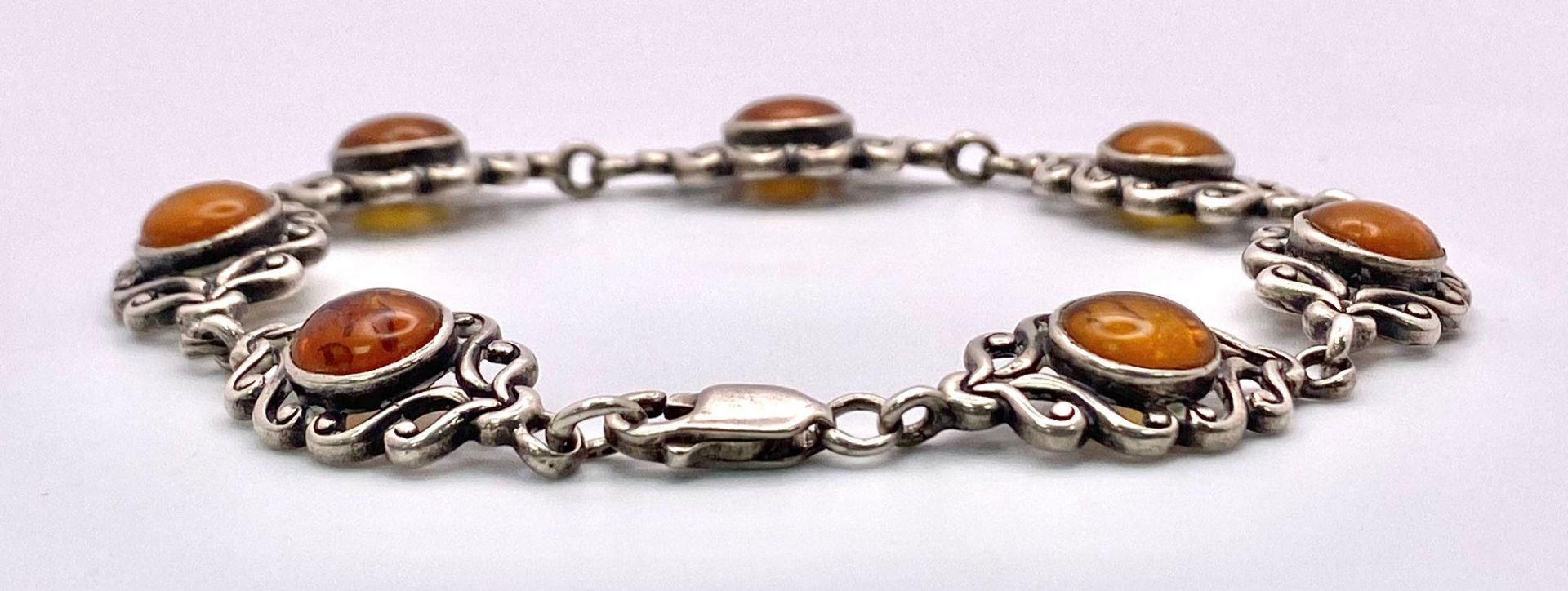 A parcel of Sterling Silver Jewellery. Featuring an amber stone bracelet (20cm) and a purple stone - Image 4 of 7