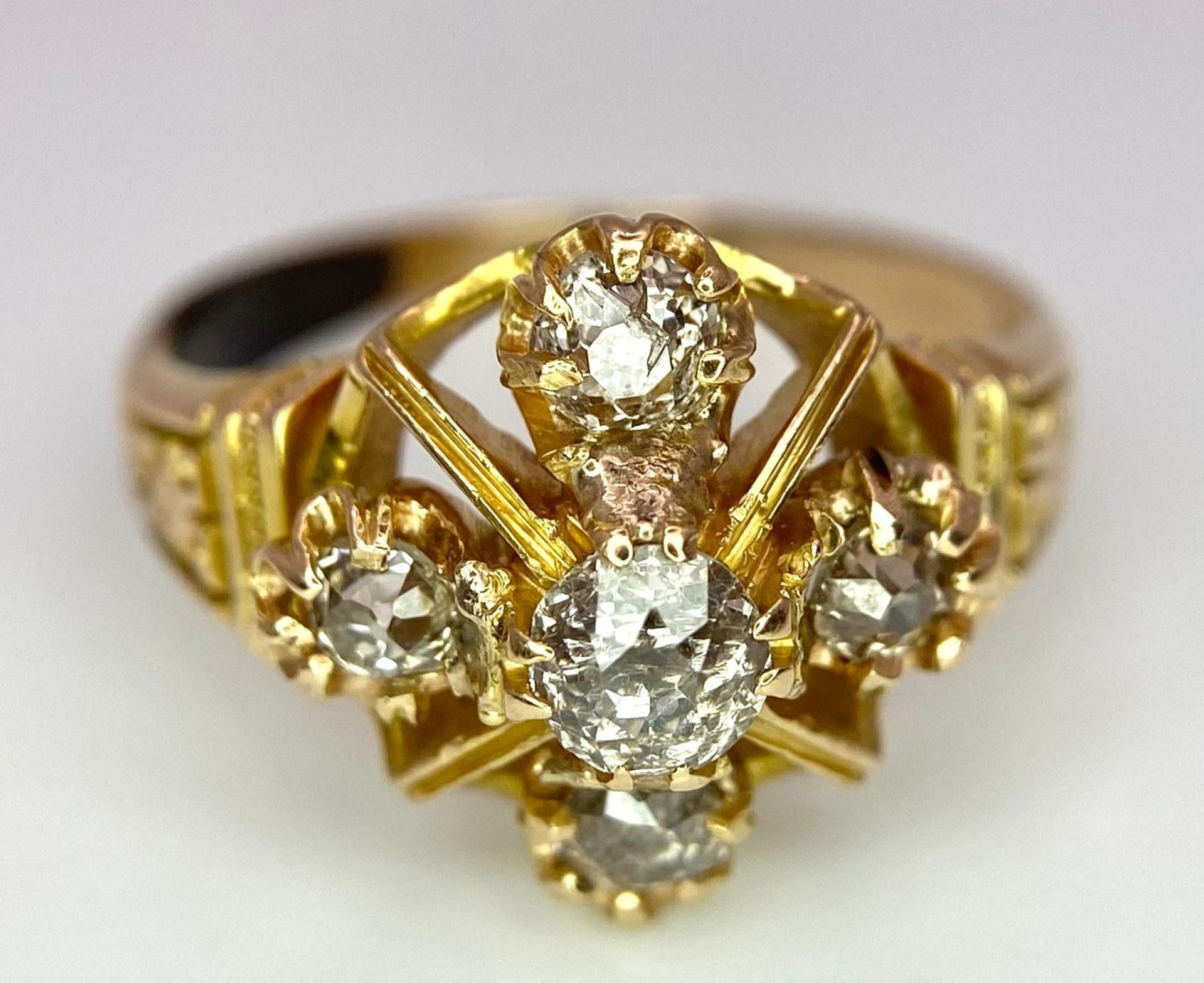 A 9K Yellow Gold (tested) Diamond Ring. Five round cut diamonds on a raised setting. Size N. 4.32g - Image 4 of 5