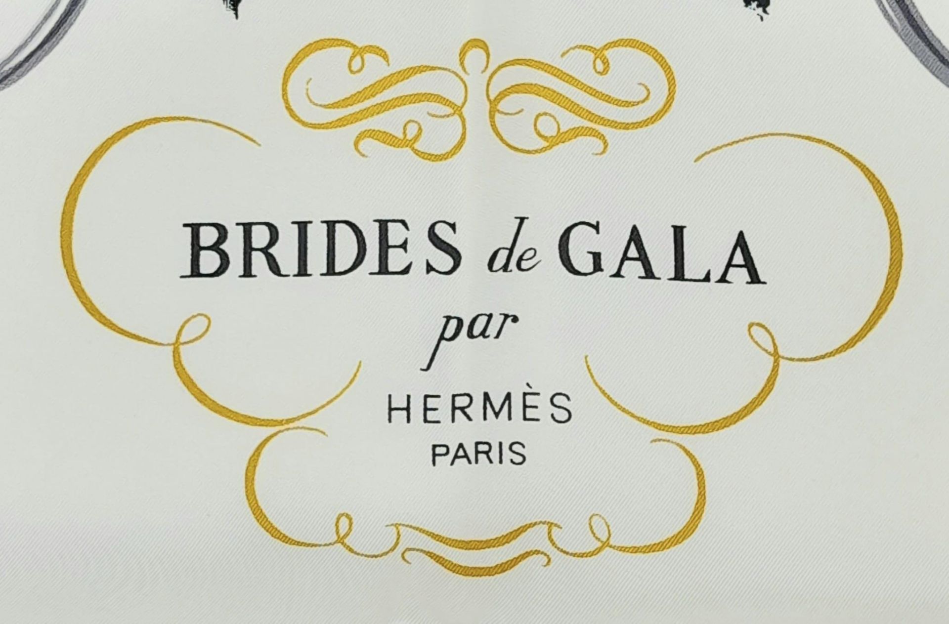 A Hermes Carre Silk Scarf "Brides de Gala" in Black, White and Gold Equestrian Print, features a - Bild 2 aus 5