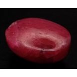 A 22.20ct Natural Ruby, in Oval Cabochon shape. Comes with the GLI certificate.