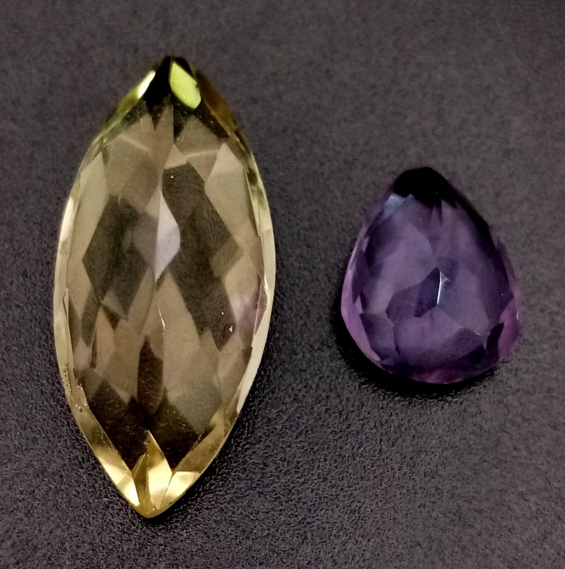 A Lot of 15.35Ct Marquise Faceted Lemon Quartz & 4.50 Ct Pear Faceted Amethyst. GLI Certified. - Image 2 of 4