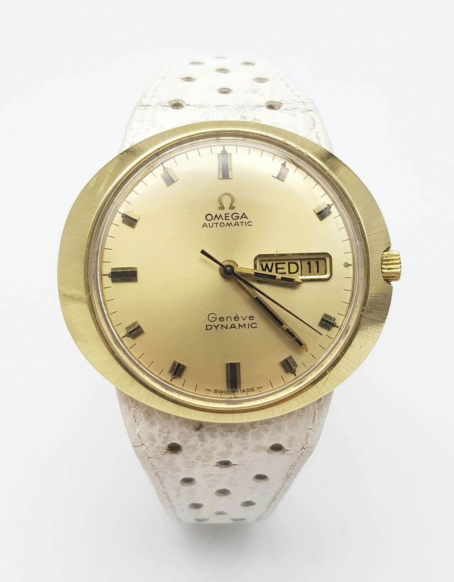 A VINTAGE OMEGA "DYNAMIC" AUTOMATIC WITH GOLDTONE DIAL AND DATE BOX ... A FUTURISTIC DESIGN FROM