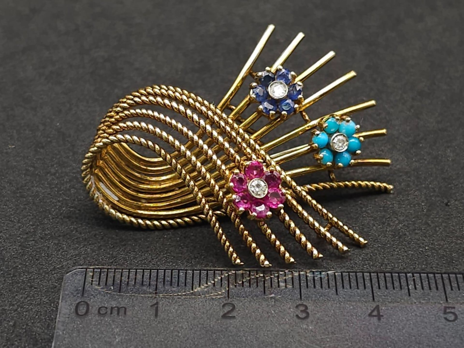 A 18kt Yellow Gold Woven Design Floral Brooch. Features three diamond centred flowers, which consist - Image 6 of 6